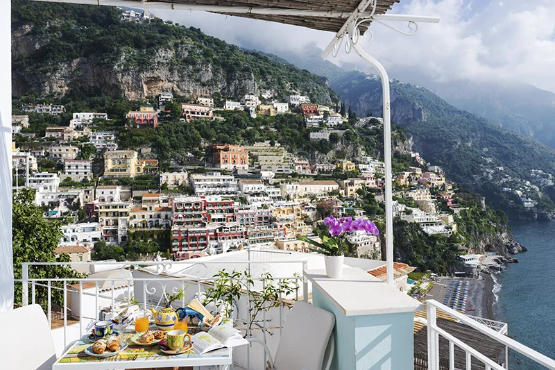 https://www.palazzotalamo.it/wp-content/uploads/2025/02/talamo-positano-superior-colazione-camere-amalfi-coast11.webp